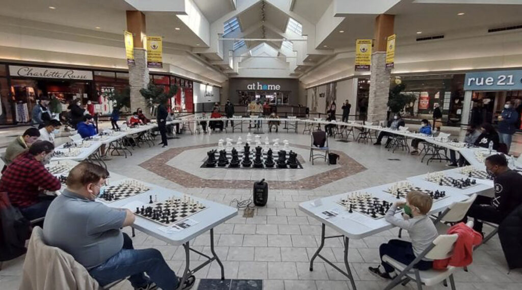 Simul against 50 players at Manassas Mall, Virginia 2022.